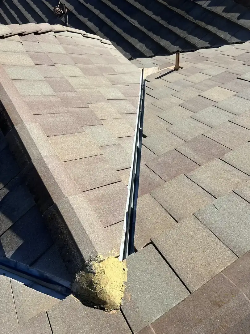 Roof tune-up valley cleaning on a tile roof in Wildomar, CA