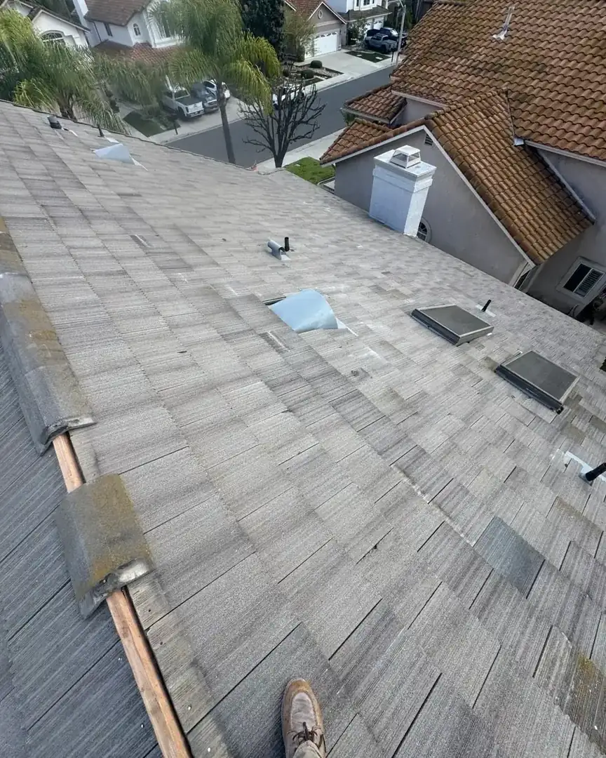 Shingle roof repair in progress in Winchester, CA