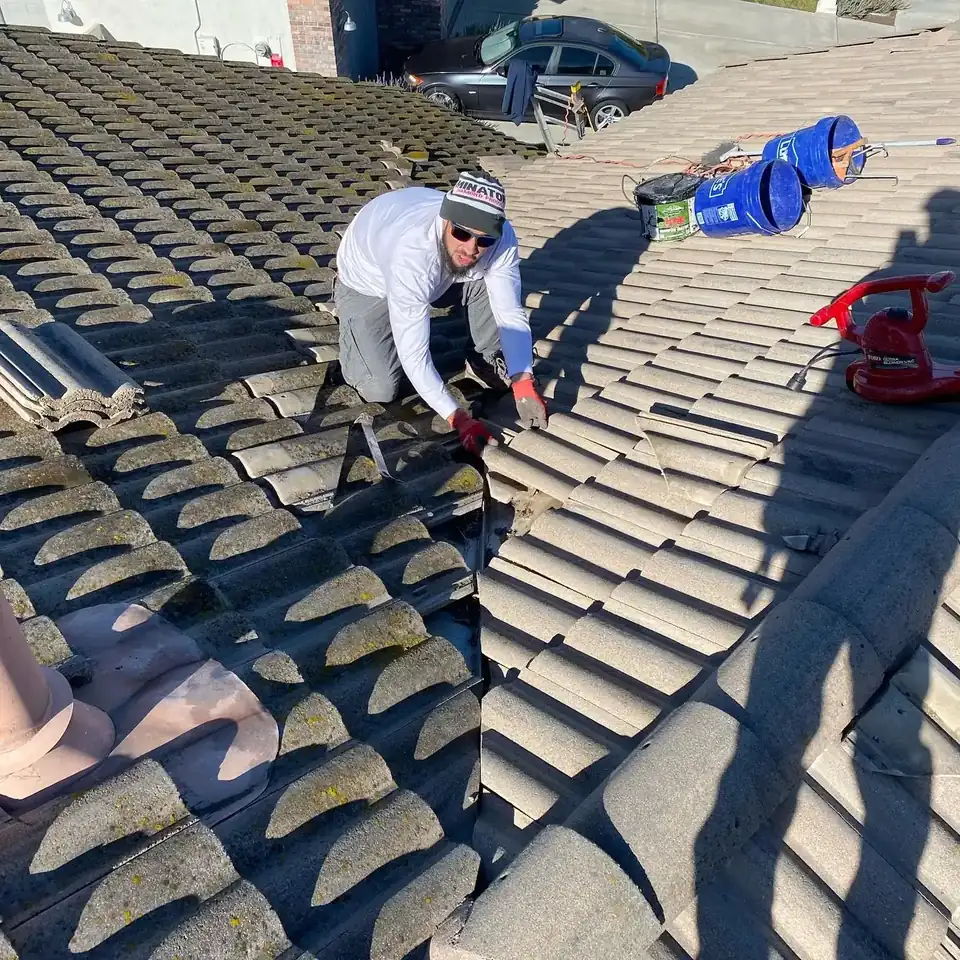 Original tiles being reinstalled after relay in Murrieta, CA