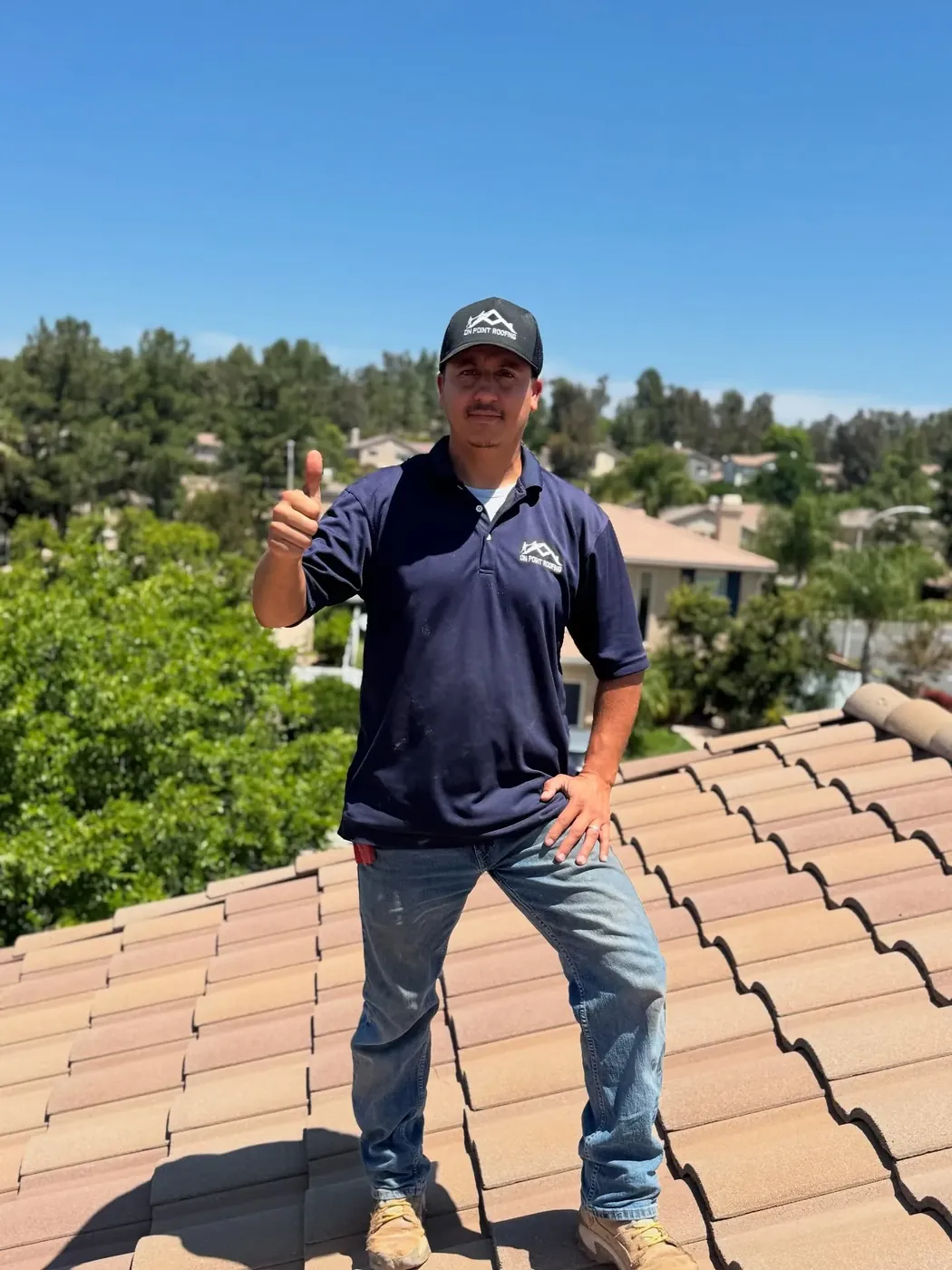 On Point Roofing Repair owner inspecting a tile roof in Wildomar, CA