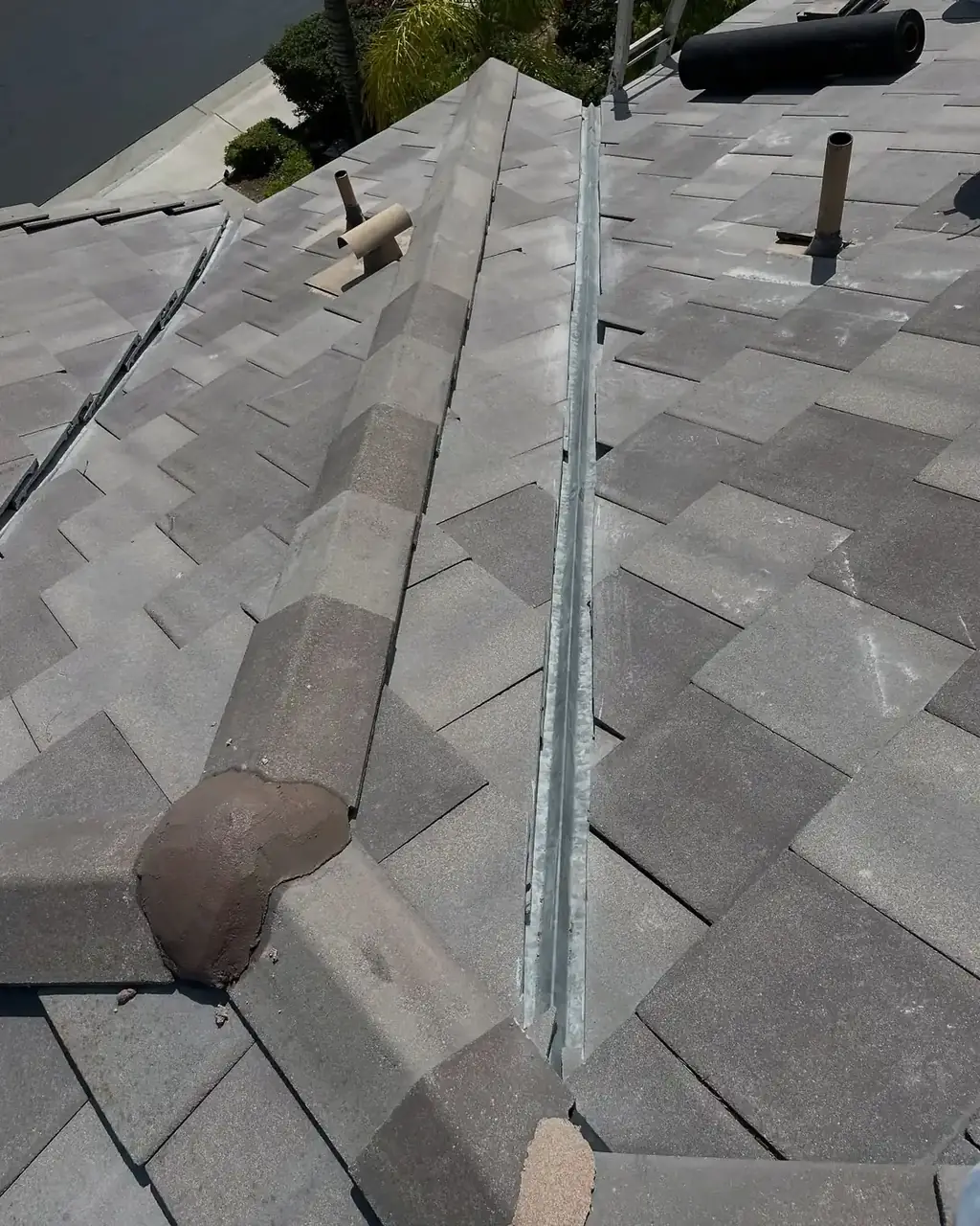 Ridge cap tile repair detail on a Riverside County home