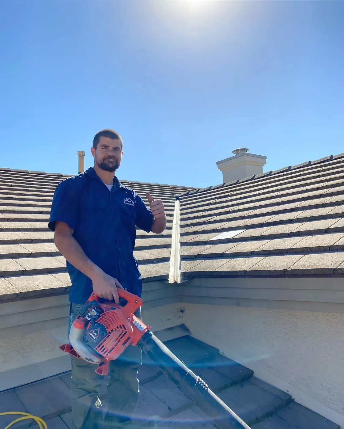 Roofer handling an emergency roof repair in Wildomar, CA